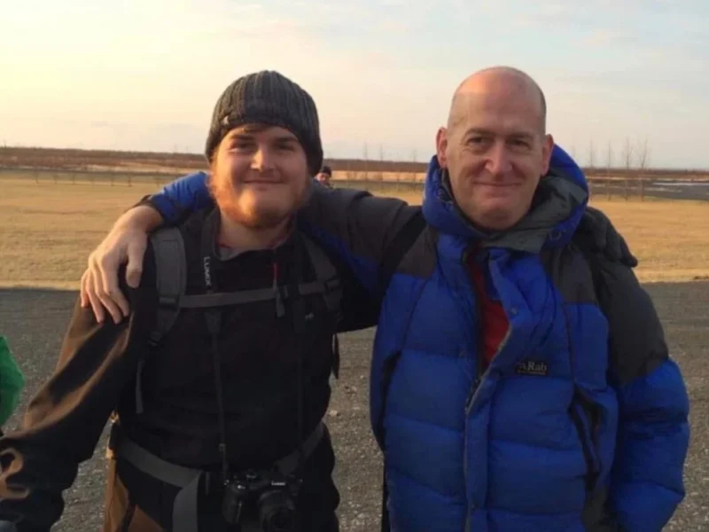 James and David Banks smiling in Iceland.