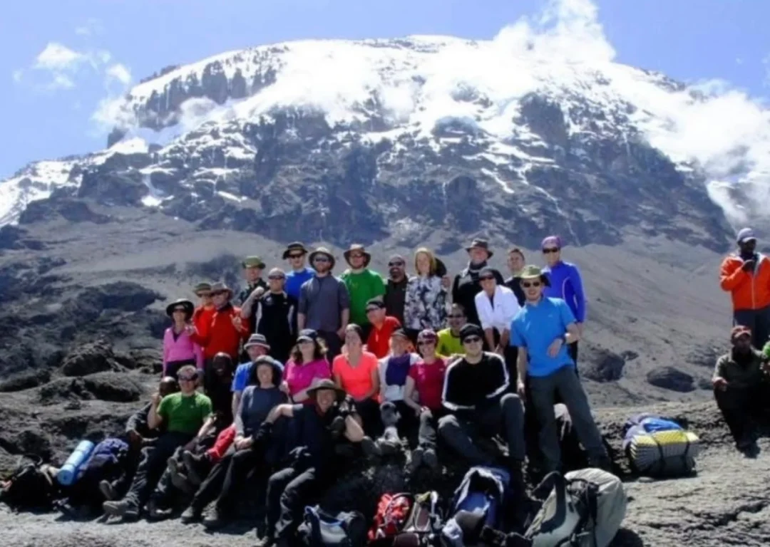 A group of fundraisers in front of Kilimanjaro.