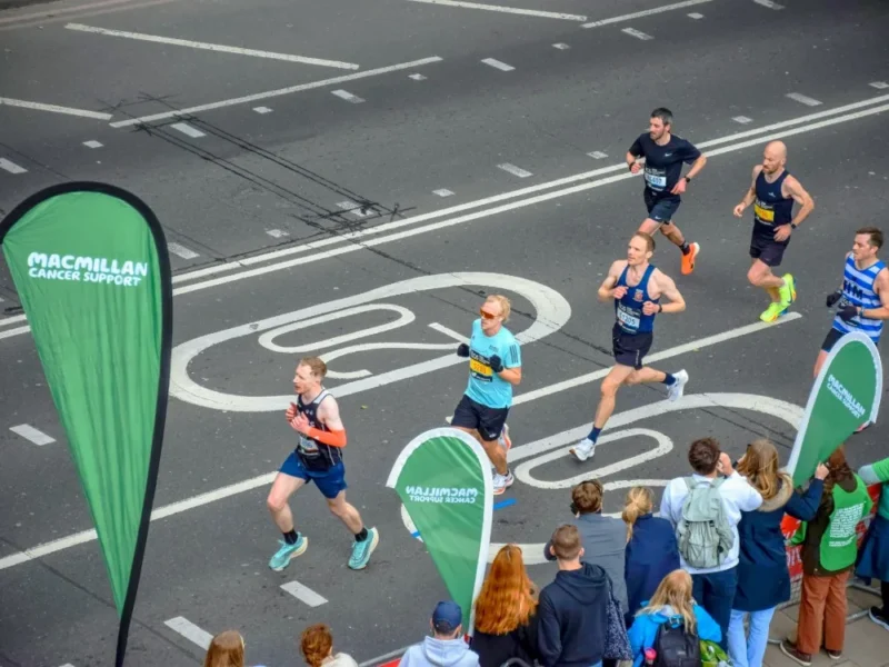 Marathon runners running in support of Macmillan Cancer Support.