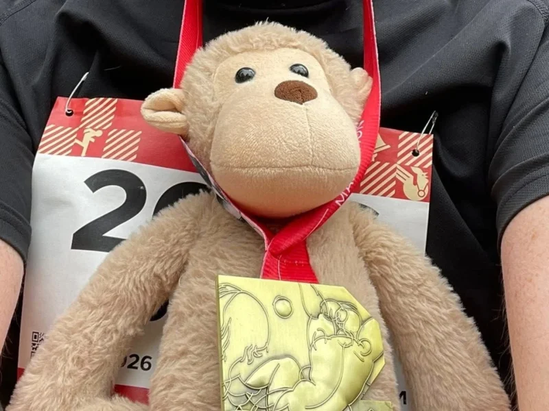 A selfie with Spunky the Monkey during the Riga Marathon 2026.